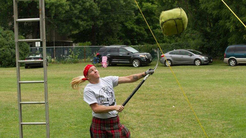 Heather throwing the sheaf