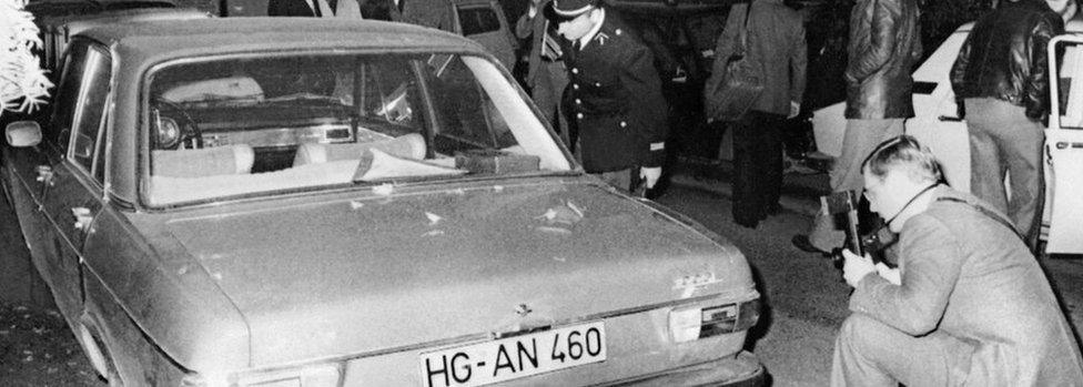 French police inspect Audi car where body of murdered industrial leader Hans Martin Schleyer was found (Oct 1977)