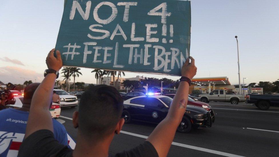 Sanders supporters back their man at the debate venue in Kendall, Florida