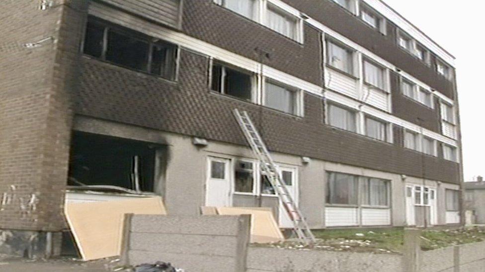 Burned-out flats on Maxton Court in Lansbury Park