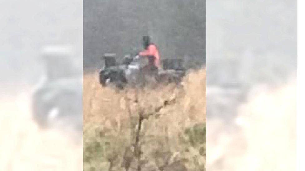 A balaclava-wearing thief stole a quad bike worth £8,000