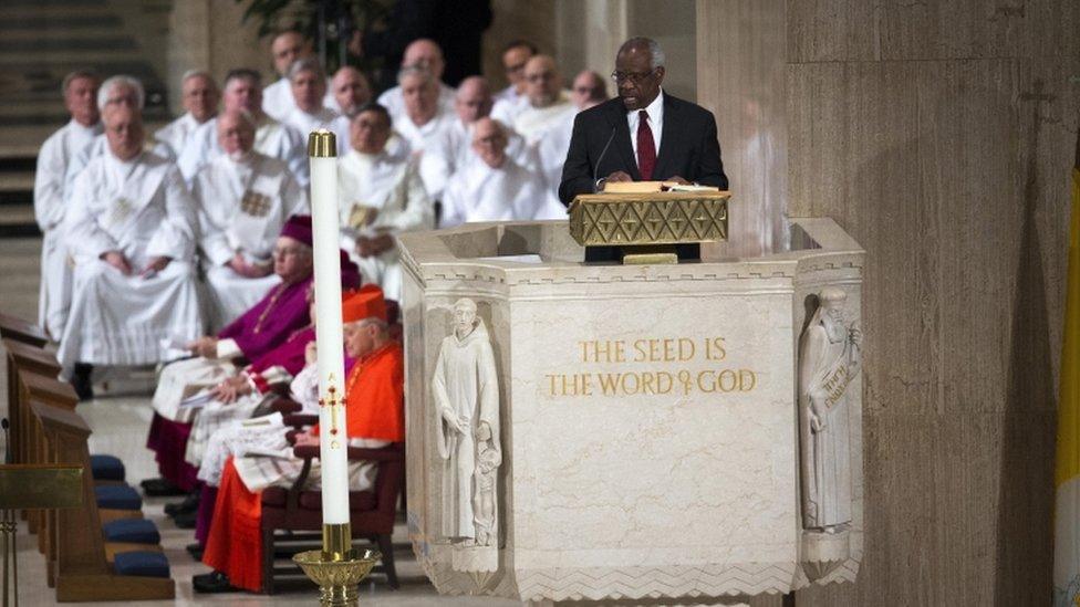 Justice Clarence Thomas reads from the Bible