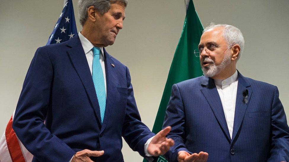 John Kerry talks to Mohammad Javad Zarif (file photo)