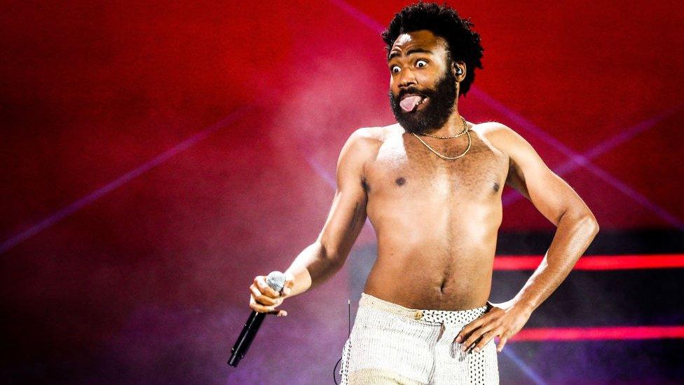 Childish Gambino performing on stage