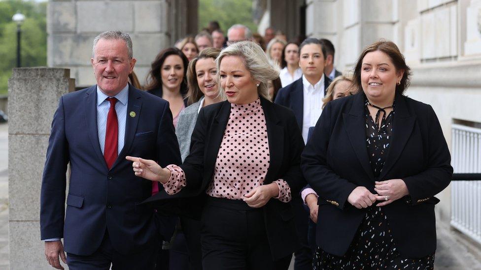 Sinn Fein;s Michelle O"Neill with her party's newly-elected MLAs in the Great Hall of Parliament Buildings at Stormont, Belfast