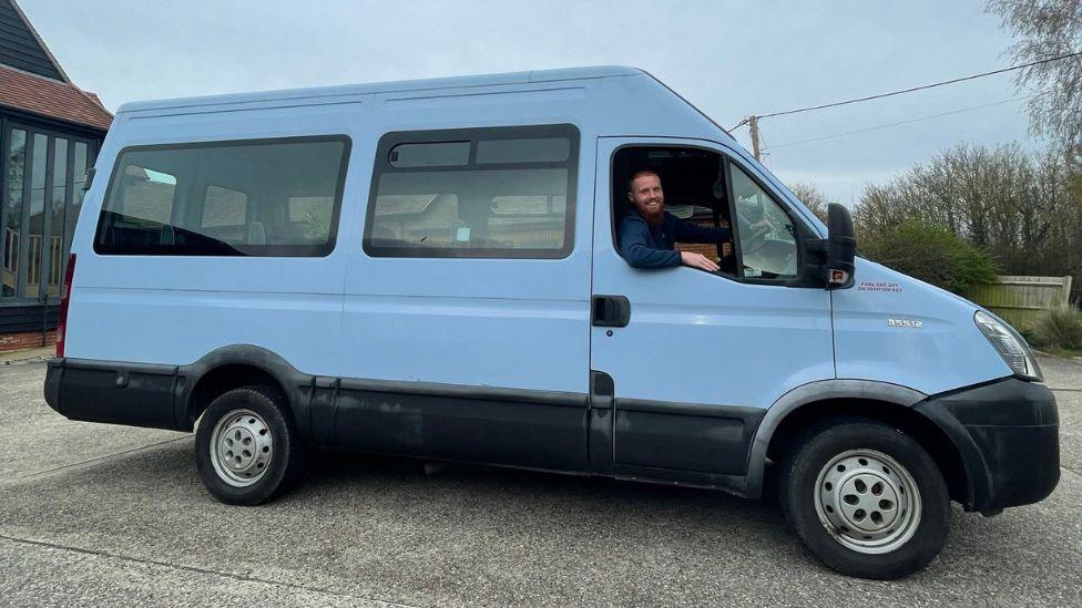 Russell Cook in his support vehicle