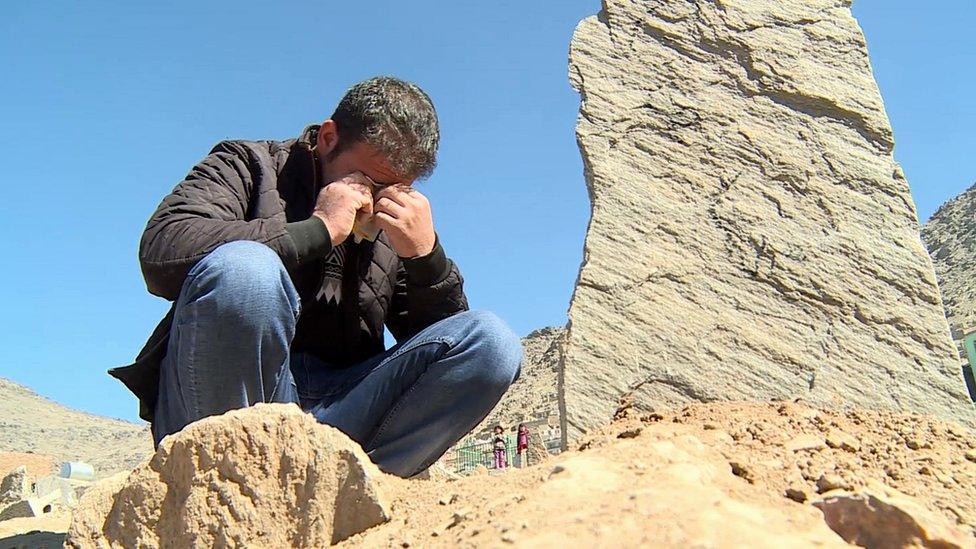 Nowrouz at the grave of his wife Nilufar in Kabul