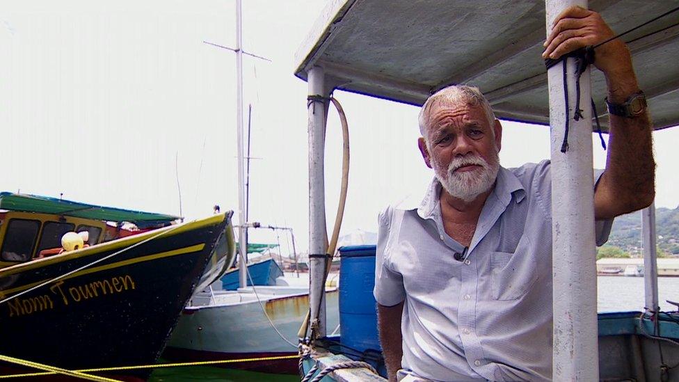 Fisherman Beatty Hoarau on his boat