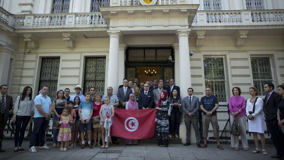 Tunisian embassy in London, staff observing silence outside