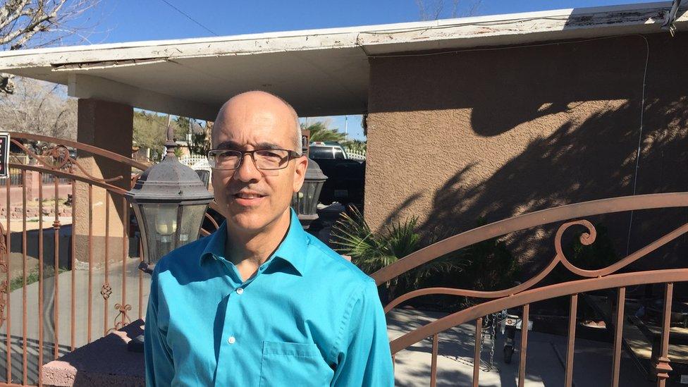 Moises Denis stands outside his cousin Marco Rubio's childhood home in Las Vegas