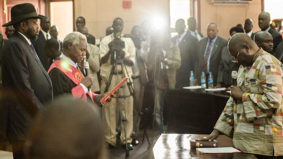 Mr Machar is pictured while being sworn in in the presence of President Salva Kiir