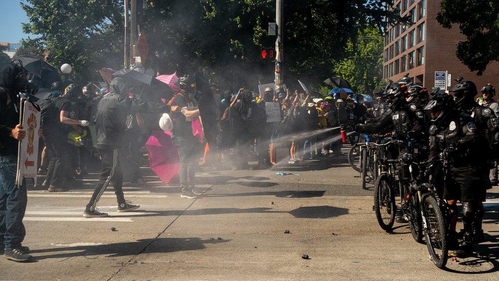 Police use pepper spray against protesters in Seattle