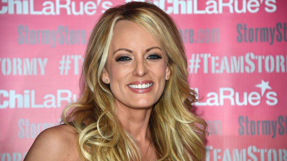 Adult film star Stormy Daniels poses at Chi Chi Laure's adult entertainment store in West Hollywood, California