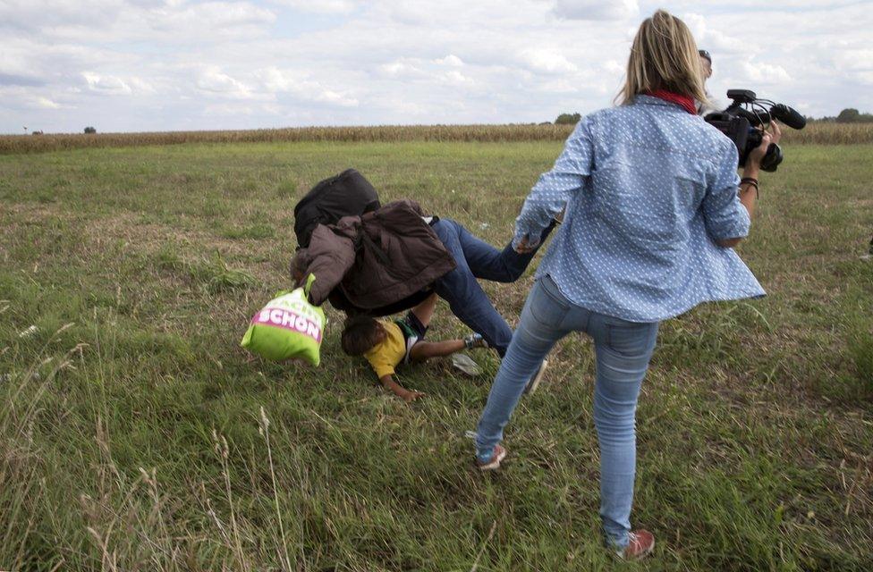 Camerawoman by Ossama and his son as they fall