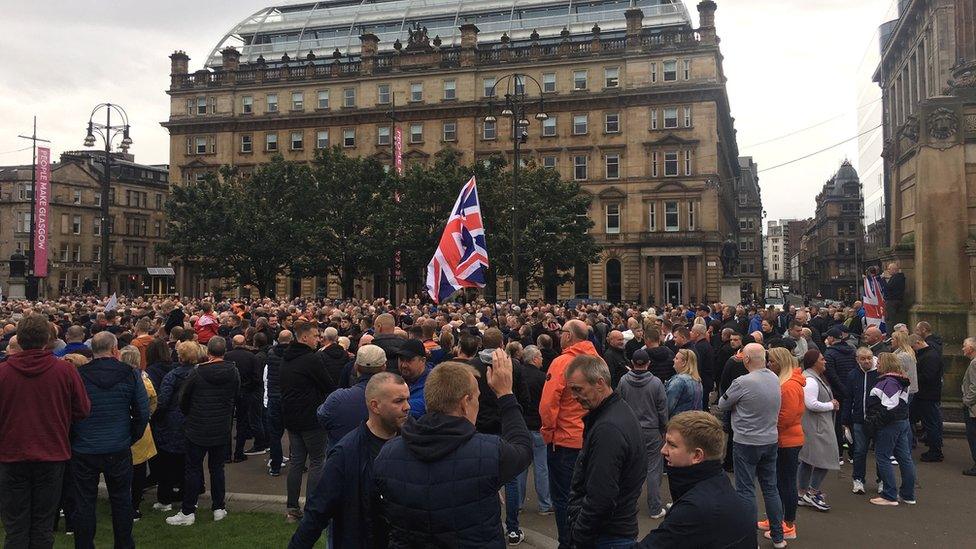 Hundreds of people have taken part in protests at the decision by Glasgow City Council to ban this weekend's marches