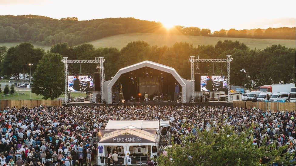 A landscape shot of the Love Supreme Festival main stage and crowd