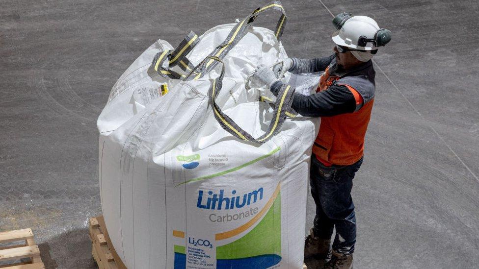 ANTOFAGASTA, CHILE - OCTOBER 25: A worker checks bags containing lithium carbonate powder suitable for batteries to be shipped internationally in Antofagasta, Chile on October 25, 2022. The Chemical and Mining Society of Chile (SQM) is expanding its mining operations in Salar de Atacama to meet the growing global demand for lithium carbonate, the main ingredient in battery production for electric vehicles. Chile is the world's second largest producer of lithium after Australia.