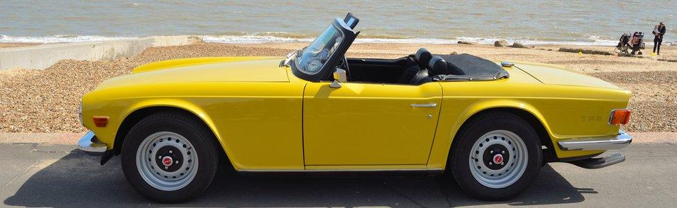 sports car on sea front