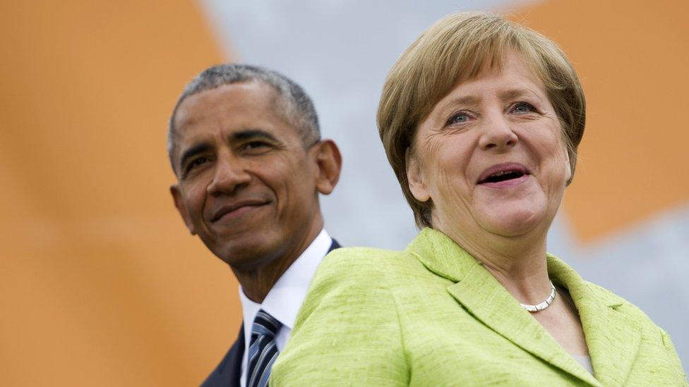 German Chancellor Angela Merkel and former President of the United States of America Barack Obama arrive for a discussion on democracy at Church Congress on May 25, 2017 in Berlin, Germany.