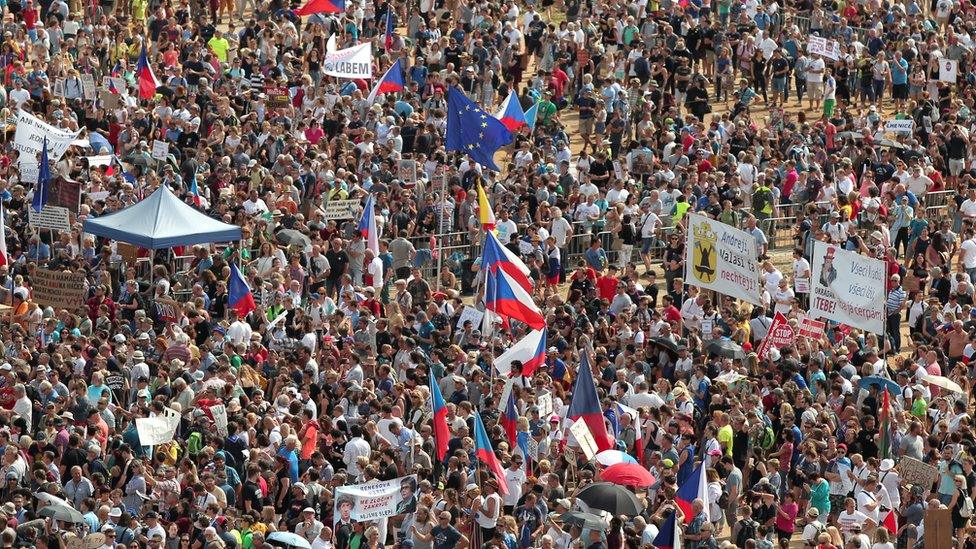 Crowds protest on the streets of Prague