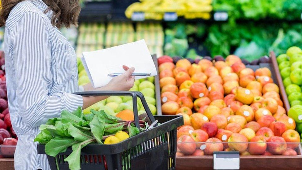 woman shopping for fruit and veg