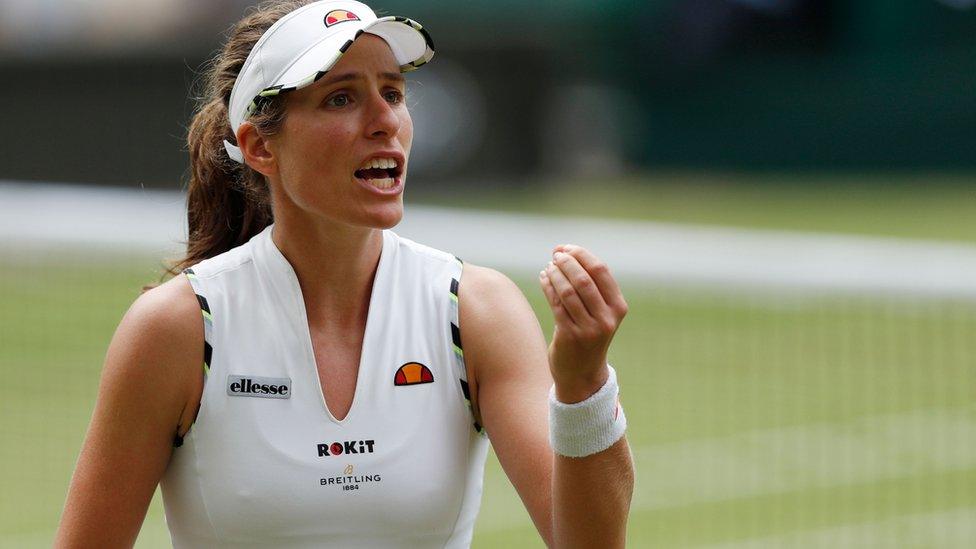 Johanna Konta reacts after hitting a shot out against Czech Republic's Barbora Strycova during their women's singles quarter-final match on day eight of the 2019 Wimbledon Championships