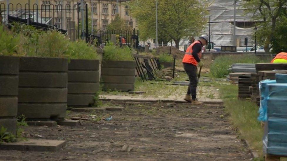 Worker on site in Queens Gardens