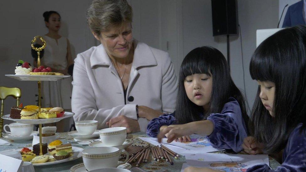 Dame Barbara Woodward, British ambassador to China, with twins Mi Ni and Mi Ai