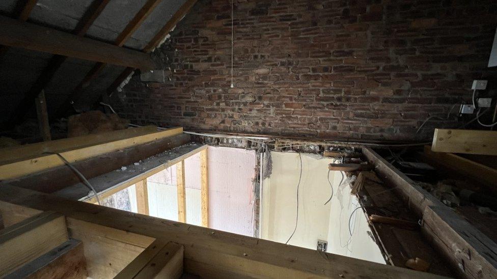 The hole in Chris Jardine's loft where the builders were supposed to put the stairs