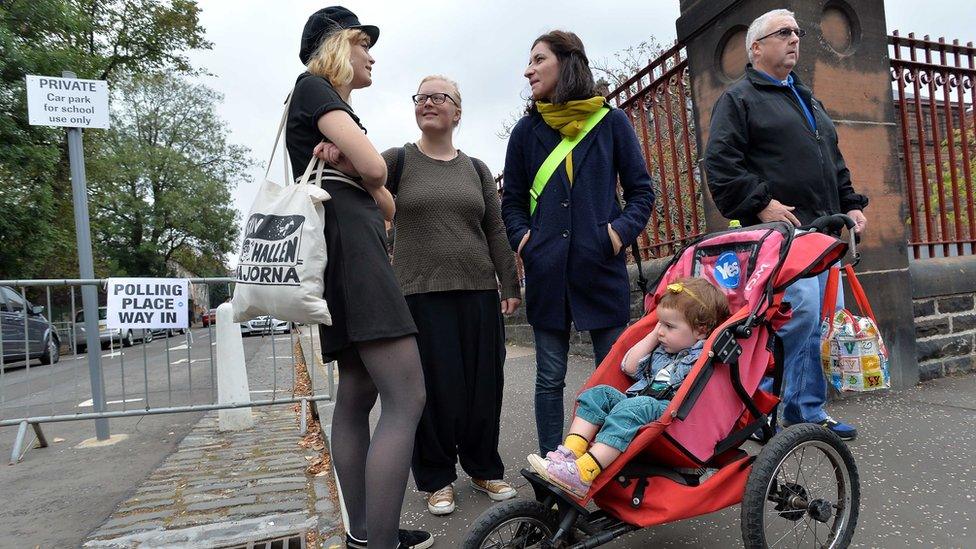 Voters at Notre Dame Primary School polling station in Glasgow in 2014