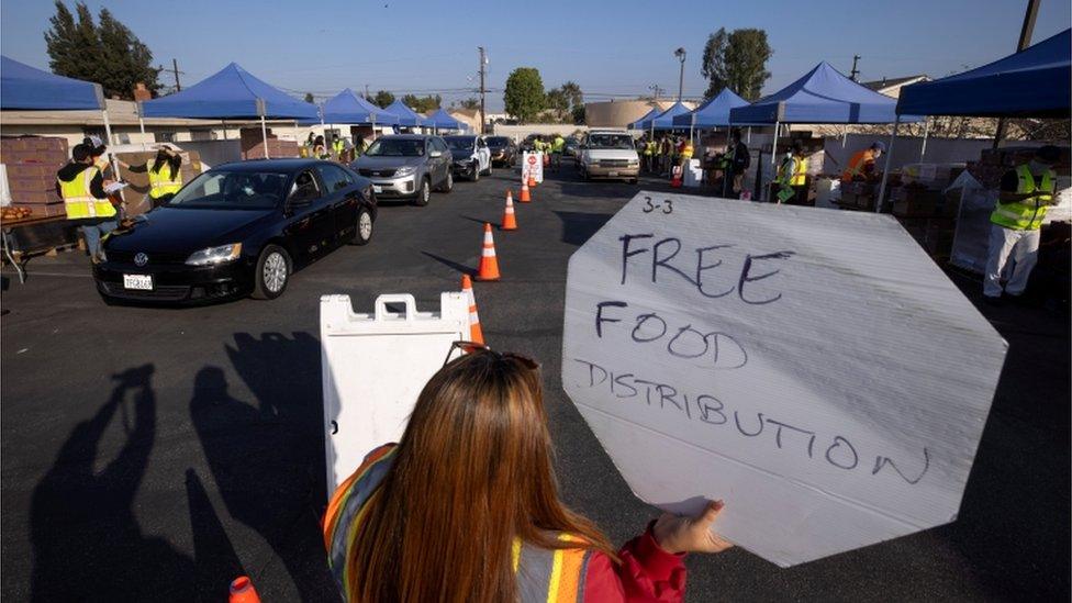 Cars line-up as the Los Angeles Regional Food Bank distributes food in California in November 2020