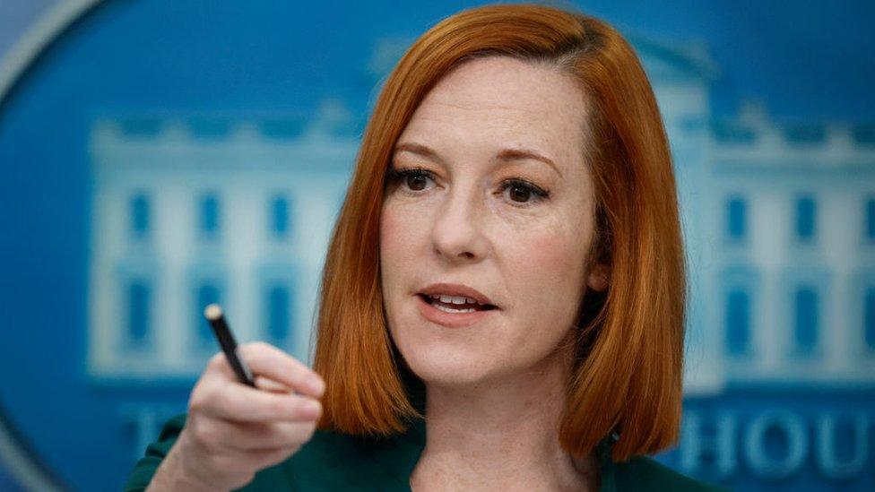 White House press secretary Jen Psaki talks to reporters at the White House.