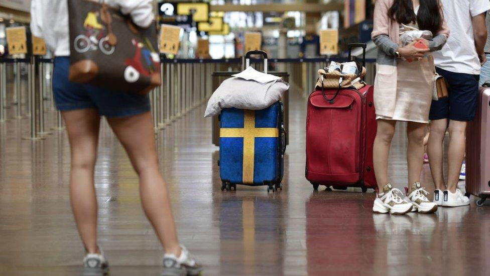 Passengers ready to check in at Arlanda airport in Stockholm