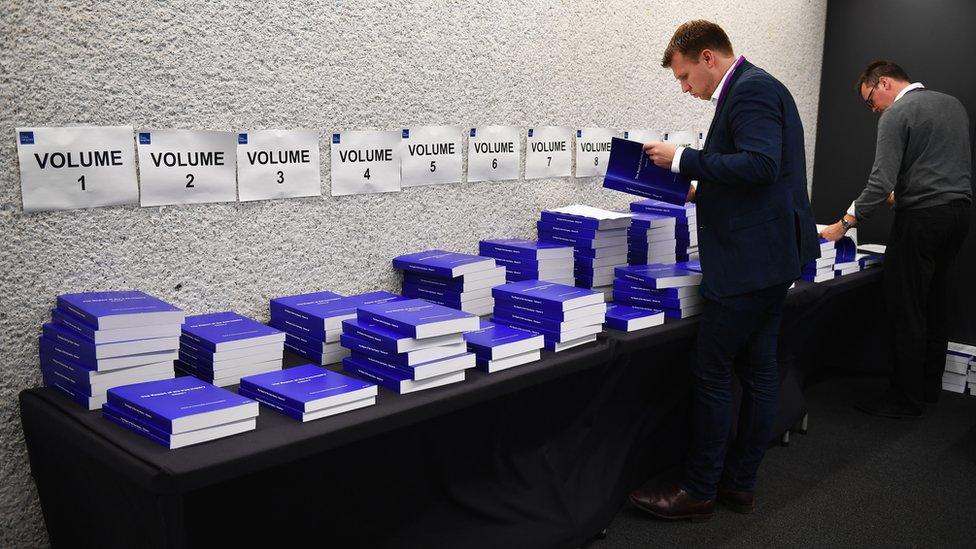 Journalists examine The Iraq Inquiry report in Westminster