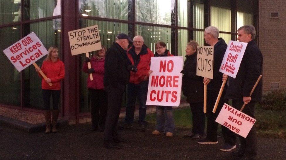 Demonstrators outside venue of Tuesday's NHS Highland board meeting