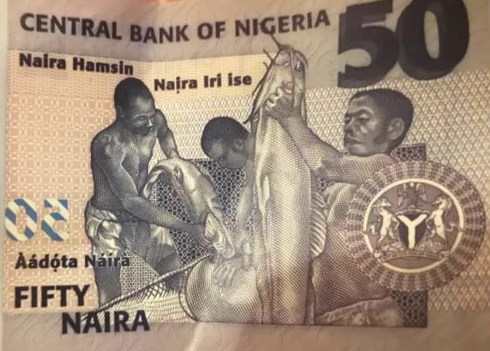 A 50 naira note with Roman script in English, Igbo, Hausa and Yoruba