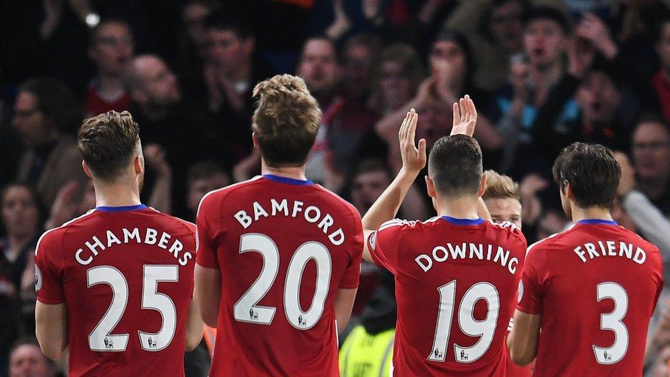 Middlesborough players acknowledge their fans following their 0-3 loss in the English Premier League soccer match between Chelsea FC and Middlesborough FC at Stamford Bridge in London,