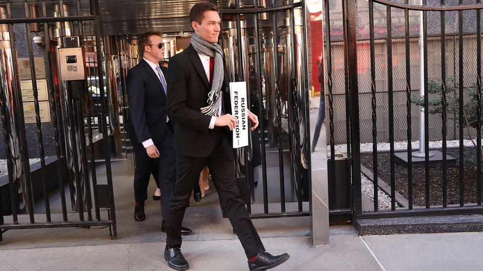 People exit the Permanent Russian Mission to the United Nations on March 26, 2018 in New York City