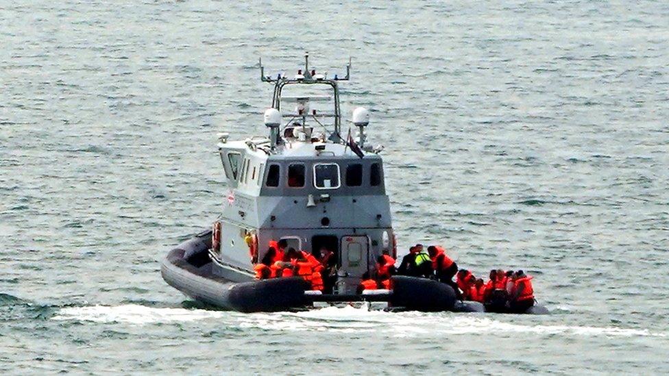 A Border Force vessel intercepts a group of people thought to be migrants in a small boat off the coast of Dover in Kent in September 2021