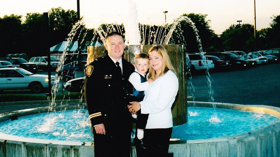 Chris Prochut and his wife and child.