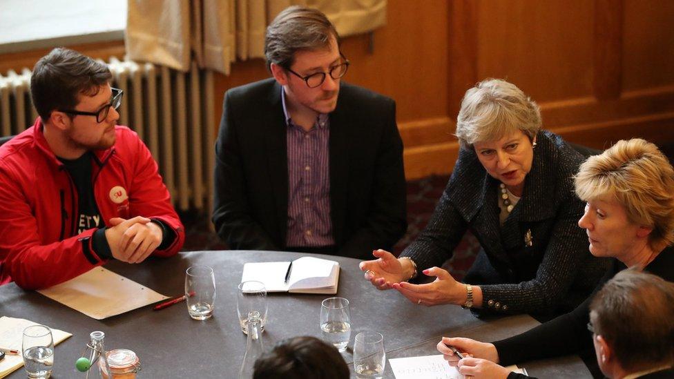 Prime Minister Theresa May speaks to people at Queen's University in Belfast