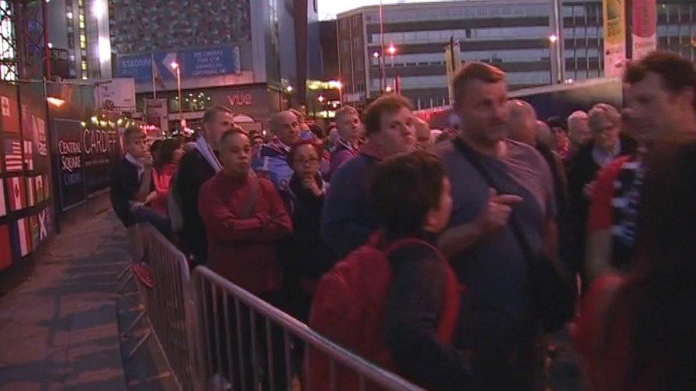 Fans queue after Wales v Fuji on October 1