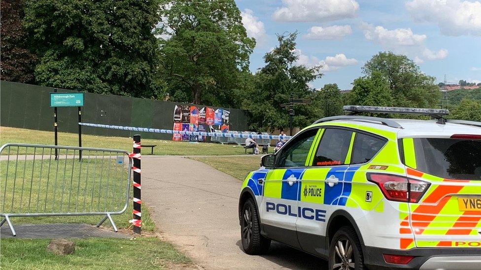 Image of a police car and police tape at Hillsborough Park