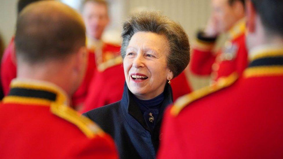 The Princess Royal, Princess Margaret, smiles as she speaks to military servicemen