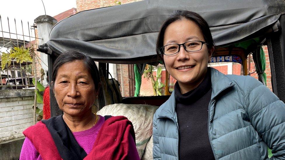 Eli Yambem, Dweller Teas founder (right), Bina Nongthombam, gatherer for Dweller Teas (left)