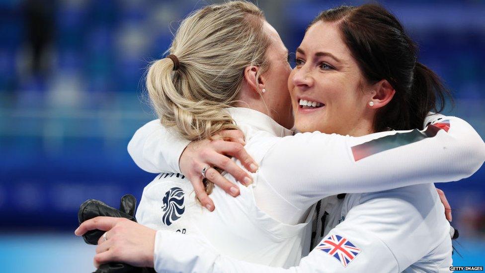 A photo of Team GB curlers Eve Muirhead and Vicky Wright hugging