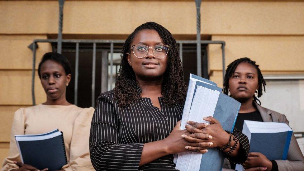 Kenyan lawyer Mercy Mutemi (centre) outside court in Nairobi