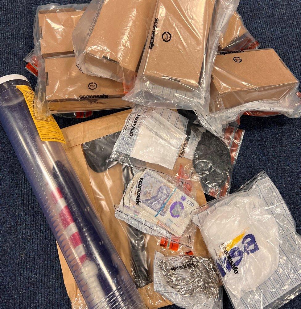 Drugs, cash, weapons and designer jewellery and clothing were found during police raids