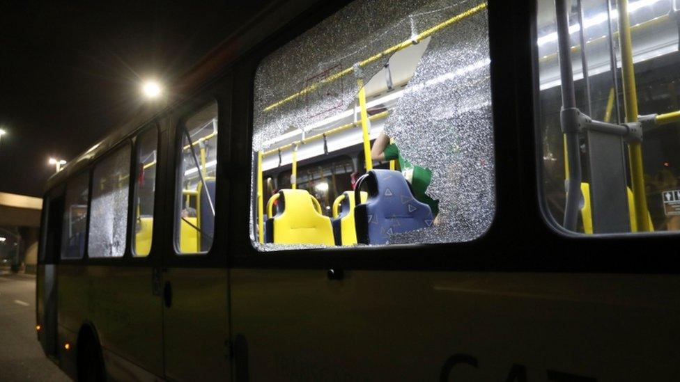 Damage to a press bus in Rio de Janeiro, 9 August 2016