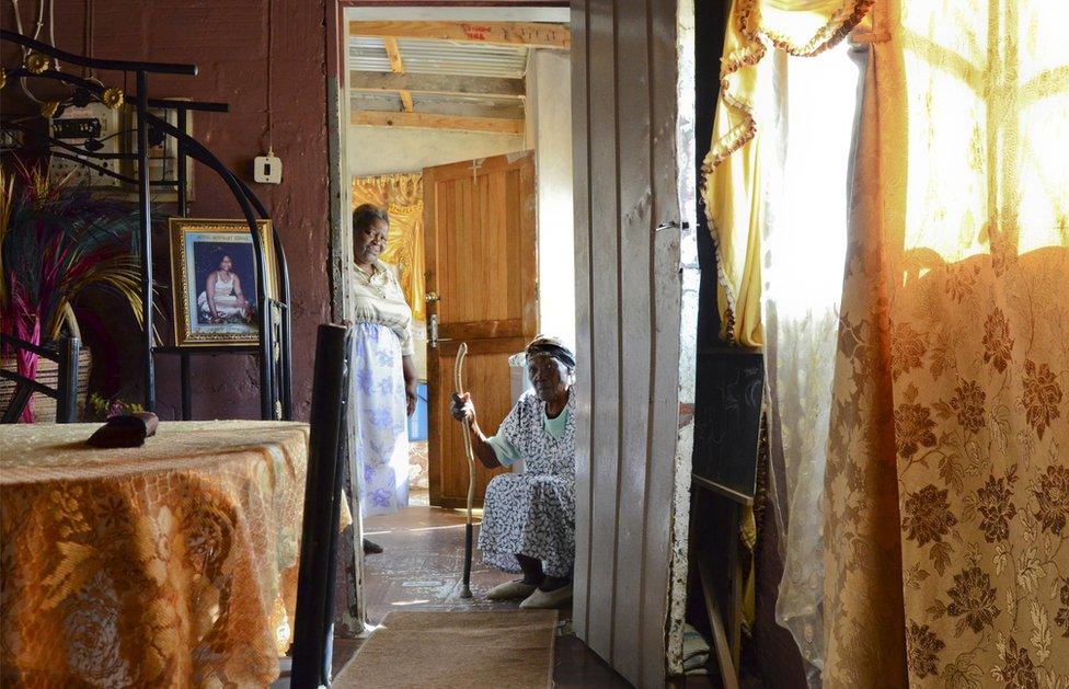 Two people inside a house in South Africa